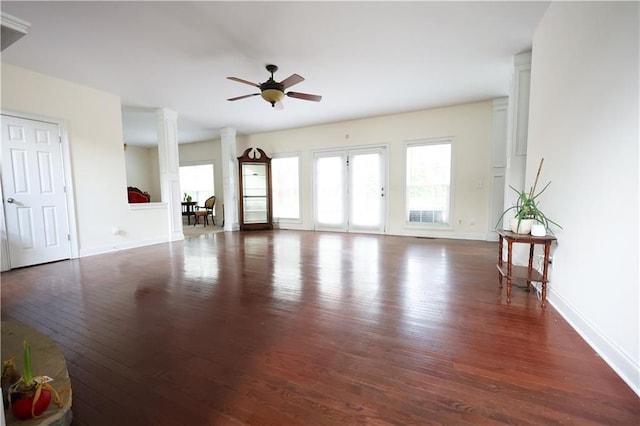 5452 Old Dalton Rd NE, Calhoun, GA 30701 - living area with wood finished floors, ceiling fan, and ornate columns