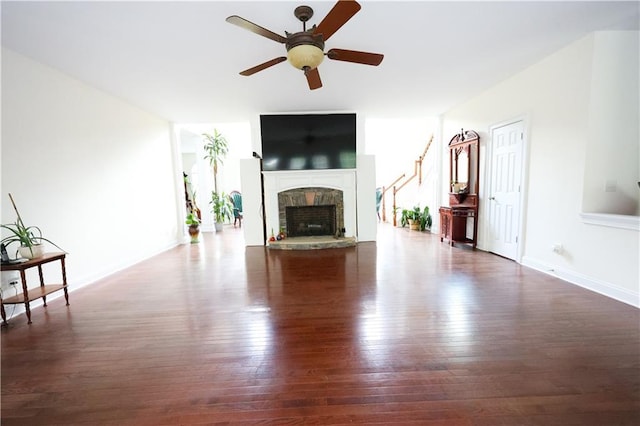 5452 Old Dalton Rd NE, Calhoun, GA 30701 - unfurnished living room featuring hardwood / wood-style floors, ceiling fan, and a fireplace