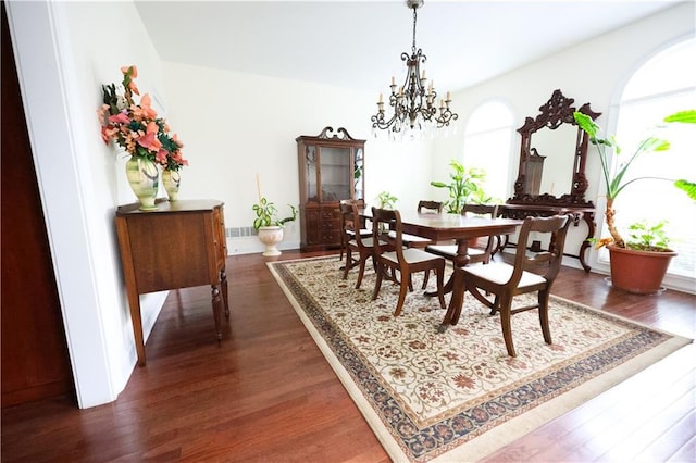 5452 Old Dalton Rd NE, Calhoun, GA 30701 - dining space featuring dark wood-style floors and a chandelier