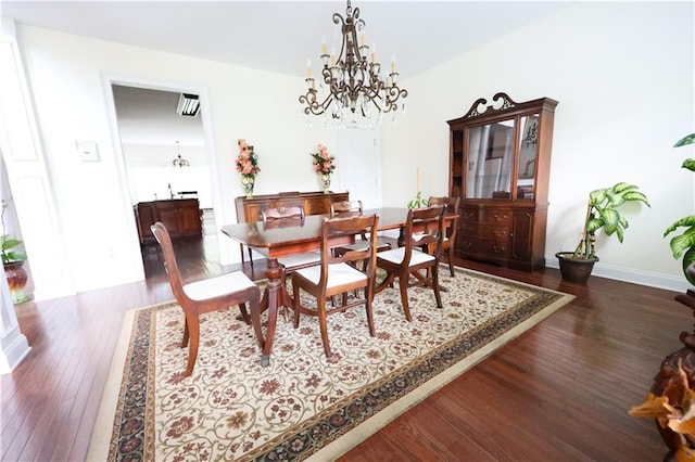 5452 Old Dalton Rd NE, Calhoun, GA 30701 - dining space with a chandelier and wood finished floors