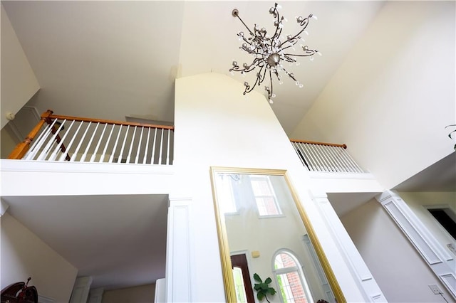 5452 Old Dalton Rd NE, Calhoun, GA 30701 - stairway featuring a towering ceiling and a chandelier