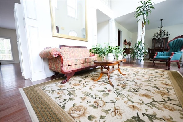 5452 Old Dalton Rd NE, Calhoun, GA 30701 - living area featuring ornate columns, wood finished floors, and a high ceiling