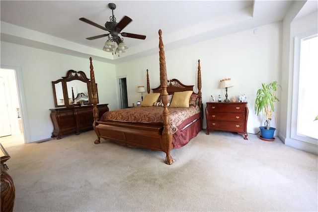 5452 Old Dalton Rd NE, Calhoun, GA 30701 - bedroom with a raised ceiling, light carpet, and a ceiling fan