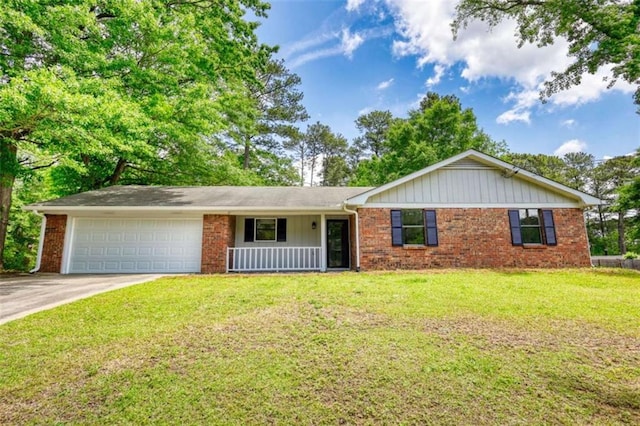 2931 Randolph Ct, Conyers, GA 30012 - single story home with a garage, concrete driveway, brick siding, and a front yard