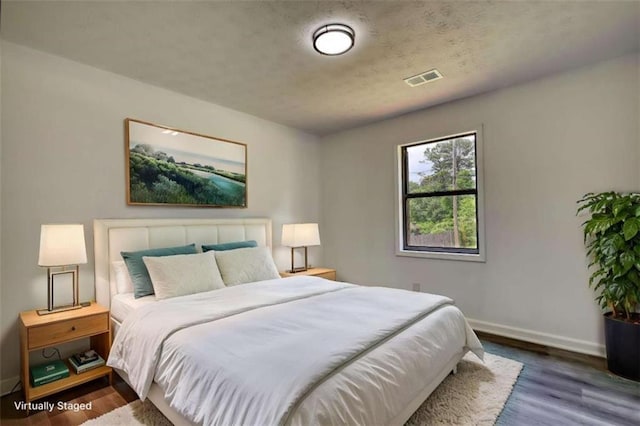 2931 Randolph Ct, Conyers, GA 30012 - bedroom with baseboards and wood finished floors