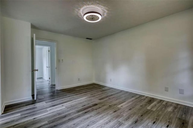 2931 Randolph Ct, Conyers, GA 30012 - empty room featuring wood finished floors and baseboards