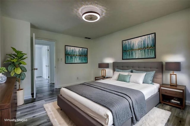 2931 Randolph Ct, Conyers, GA 30012 - bedroom featuring wood finished floors and baseboards