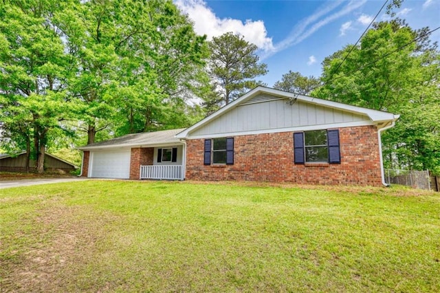 2931 Randolph Ct, Conyers, GA 30012 - ranch-style home featuring concrete driveway, an attached garage, and brick siding