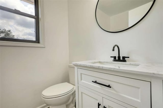 2931 Randolph Ct, Conyers, GA 30012 - bathroom with vanity, toilet, and baseboards