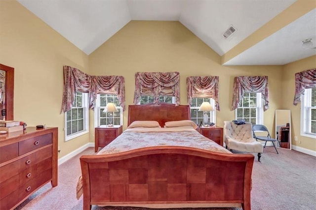 bedroom with vaulted ceiling, carpet, visible vents, and baseboards