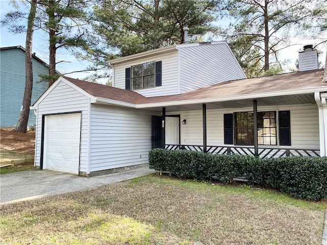 view of front facade featuring a garage, a porch, and a front yard