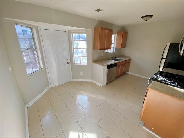 kitchen with dishwasher and refrigerator