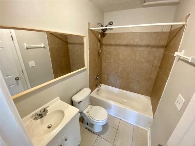 full bathroom with tiled shower / bath, vanity, toilet, and tile patterned flooring