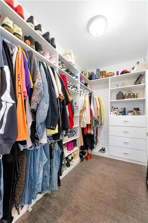 905 Juniper St NE Unit 805, Atlanta, GA 30309 - walk in closet featuring carpet