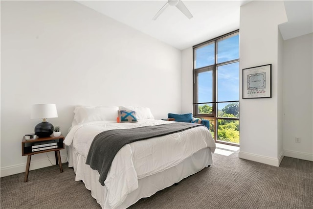 905 Juniper St NE Unit 805, Atlanta, GA 30309 - bedroom with multiple windows, a wall of windows, carpet, and ceiling fan