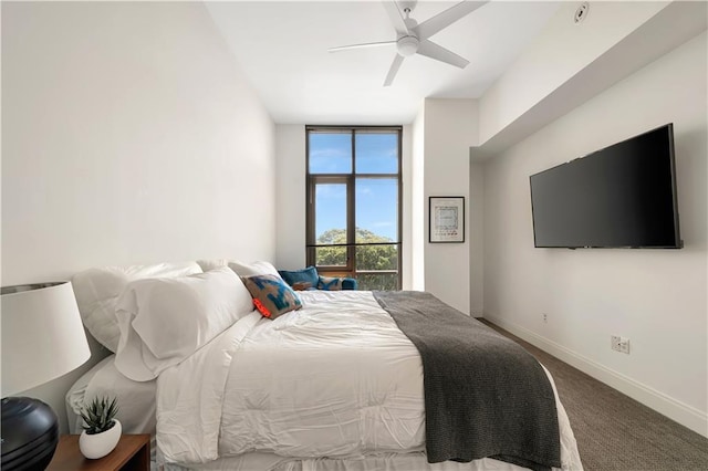 905 Juniper St NE Unit 805, Atlanta, GA 30309 - carpeted bedroom with floor to ceiling windows and a ceiling fan