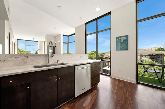 905 Juniper St NE Unit 805, Atlanta, GA 30309 - kitchen featuring dishwasher, dark wood-style floors, dark brown cabinets, light stone counters, and floor to ceiling windows