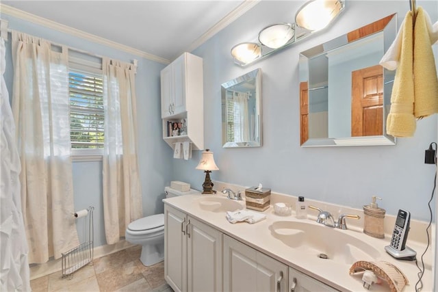 bathroom with radiator heating unit, vanity, toilet, and crown molding