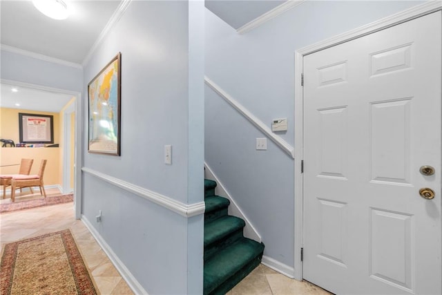 staircase featuring tile patterned floors and crown molding