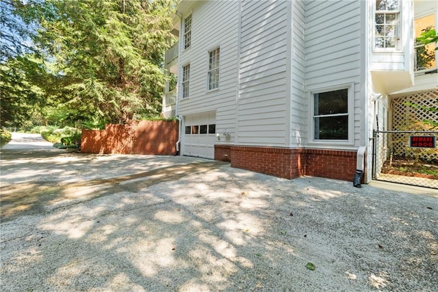 view of home's exterior with a garage