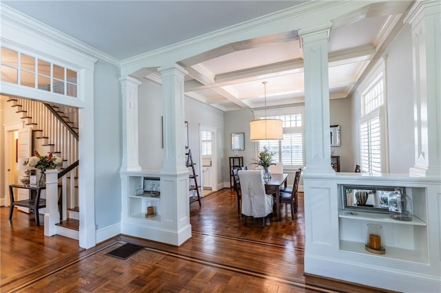 interior space with dark parquet floors, ornate columns, and ornamental molding