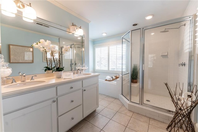 bathroom featuring separate shower and tub, dual vanity, tile patterned floors, and crown molding