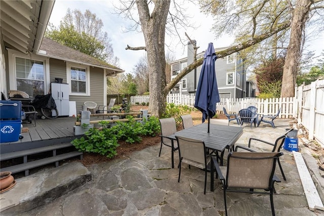 view of patio with a wooden deck