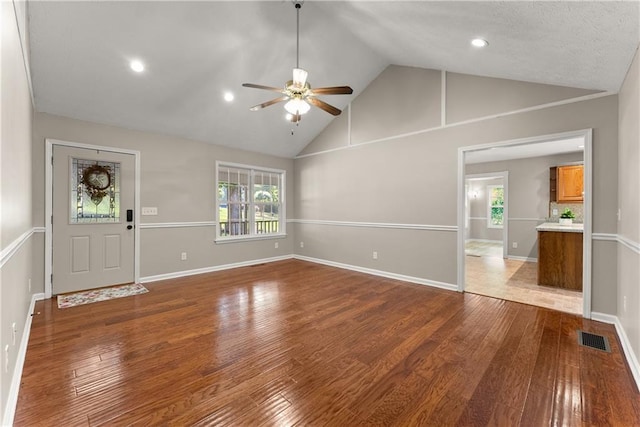 241 Cook St, Alto, GA 30510 - unfurnished living room featuring a ceiling fan, high vaulted ceiling, wood finished floors, recessed lighting, and baseboards