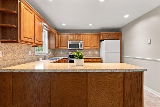241 Cook St, Alto, GA 30510 - kitchen featuring stainless steel appliances, open shelves, light countertops, tasteful backsplash, and recessed lighting