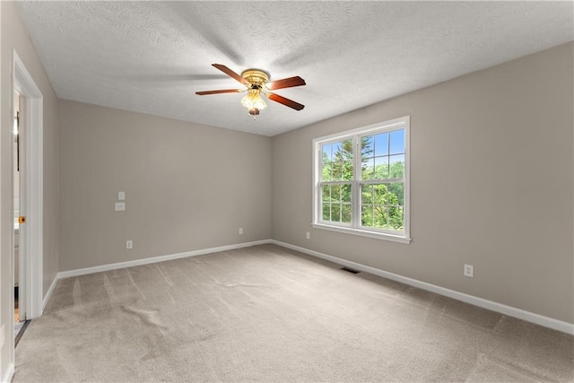 241 Cook St, Alto, GA 30510 - unfurnished room with ceiling fan, light carpet, baseboards, and a textured ceiling