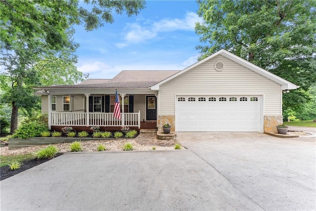 241 Cook St, Alto, GA 30510 - single story home with covered porch, driveway, an attached garage, and stone siding