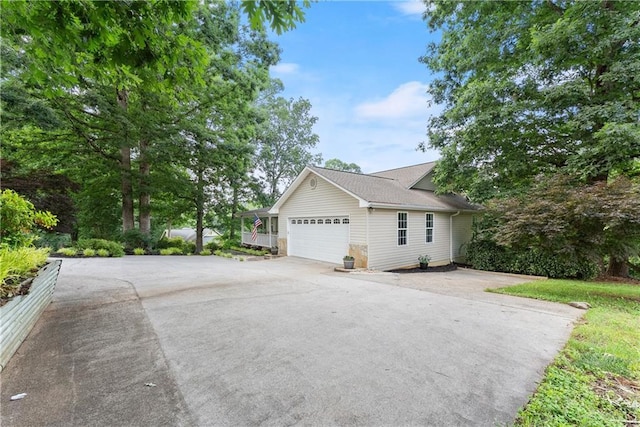 241 Cook St, Alto, GA 30510 - view of side of property with driveway and an attached garage