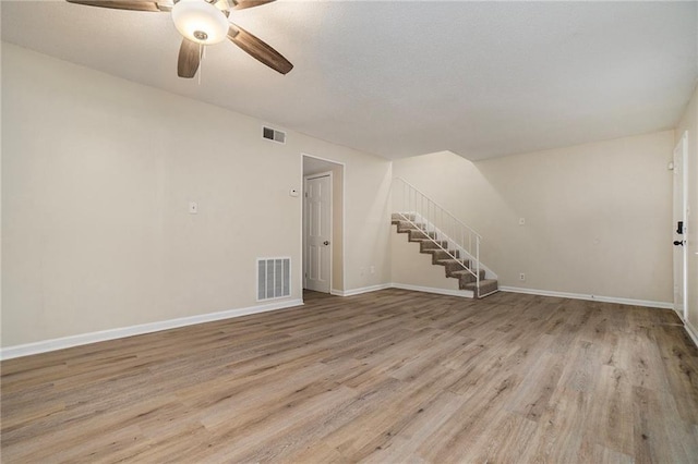 empty room featuring ceiling fan and carpet floors