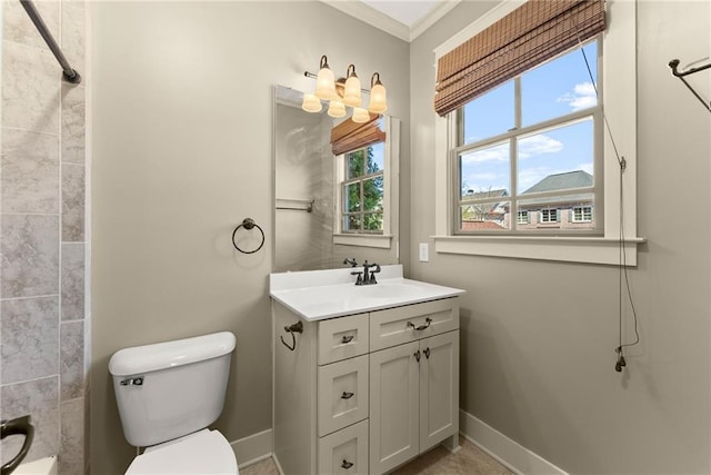 bathroom featuring vanity, baseboards, toilet, and a shower