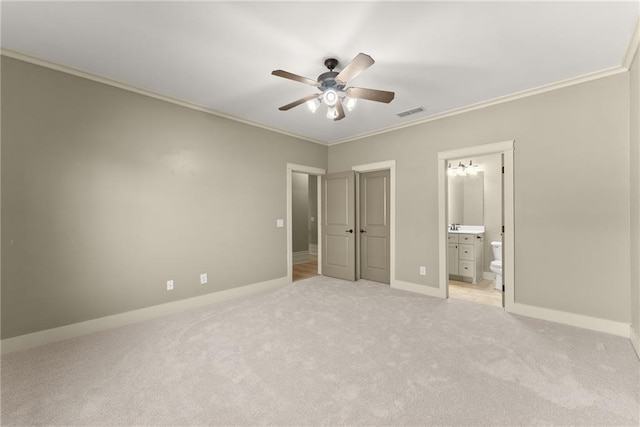 unfurnished bedroom with visible vents, ornamental molding, baseboards, and light carpet