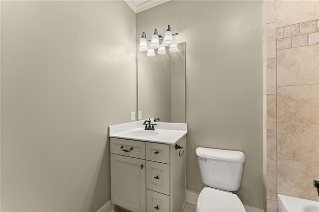 full bathroom with baseboards, ornamental molding, vanity, and toilet