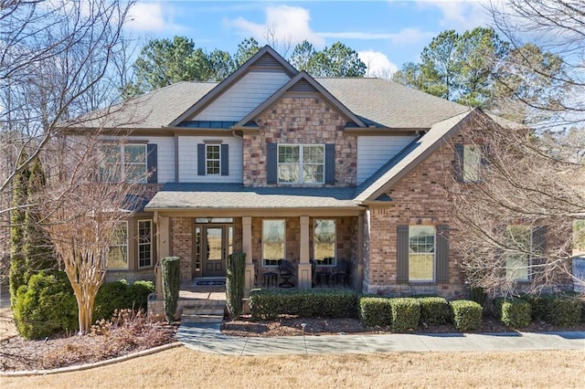 craftsman-style home with covered porch