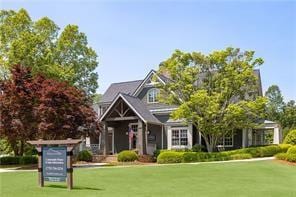 view of front of house with a front lawn