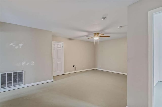 spare room with ceiling fan