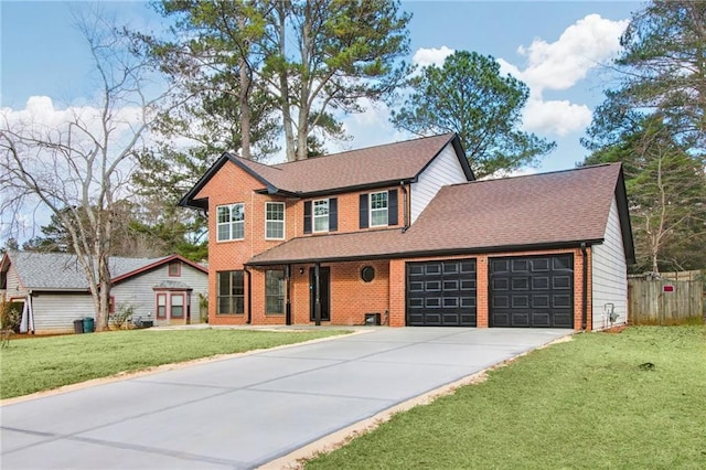 view of front of home featuring a front lawn and a garage