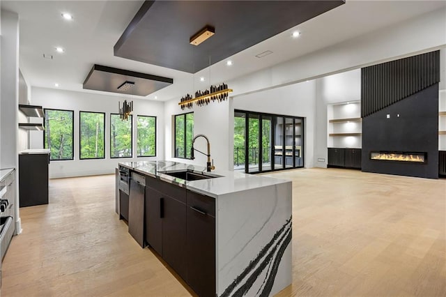 15154 Hopewell Rd, Alpharetta, GA 30004 - kitchen featuring open floor plan, a sink, dishwasher, a spacious island, and recessed lighting