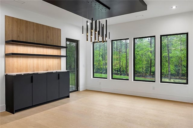 15154 Hopewell Rd, Alpharetta, GA 30004 - unfurnished dining area featuring baseboards, light wood-type flooring, a chandelier, and recessed lighting