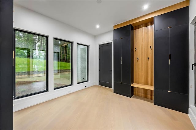 15154 Hopewell Rd, Alpharetta, GA 30004 - unfurnished bedroom with light wood finished floors and recessed lighting
