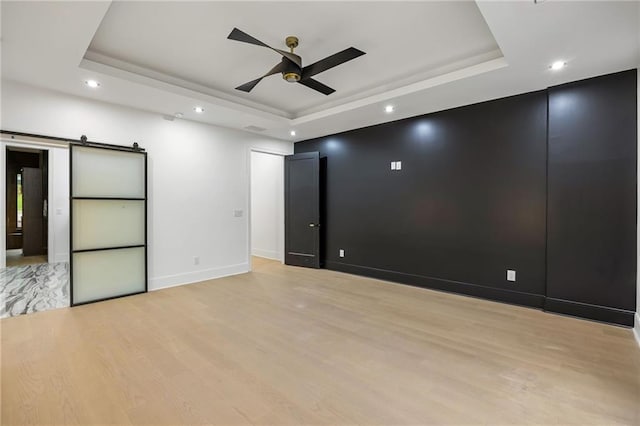 15154 Hopewell Rd, Alpharetta, GA 30004 - unfurnished room featuring a raised ceiling, light wood-style flooring, a ceiling fan, recessed lighting, and baseboards