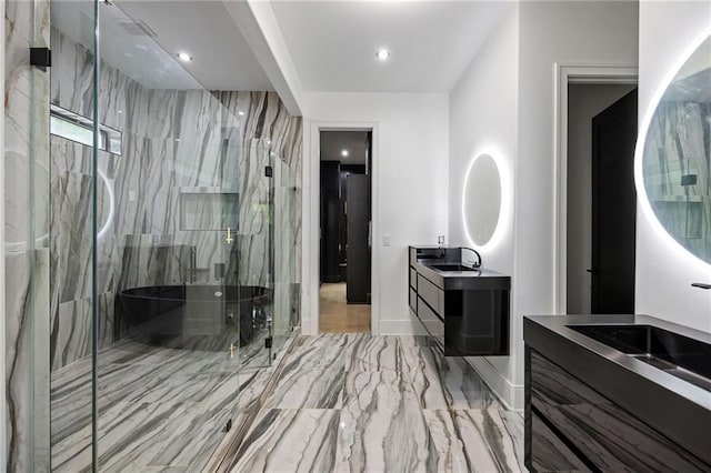15154 Hopewell Rd, Alpharetta, GA 30004 - full bathroom with a marble finish shower, two vanities, marble finish floors, recessed lighting, and baseboards