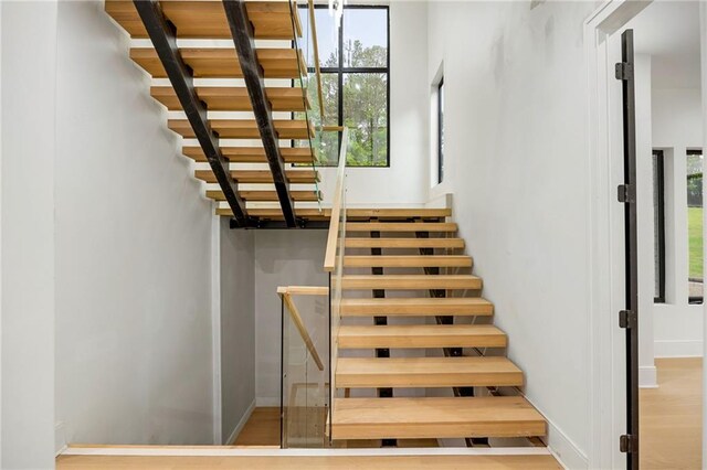 15154 Hopewell Rd, Alpharetta, GA 30004 - staircase featuring baseboards