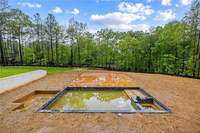 15154 Hopewell Rd, Alpharetta, GA 30004 - view of storm shelter with a view of trees