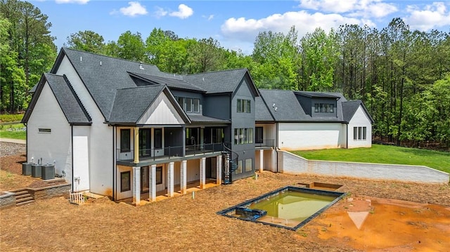 15154 Hopewell Rd, Alpharetta, GA 30004 - back of house with a shingled roof, a lawn, stairway, central air condition unit, and a patio