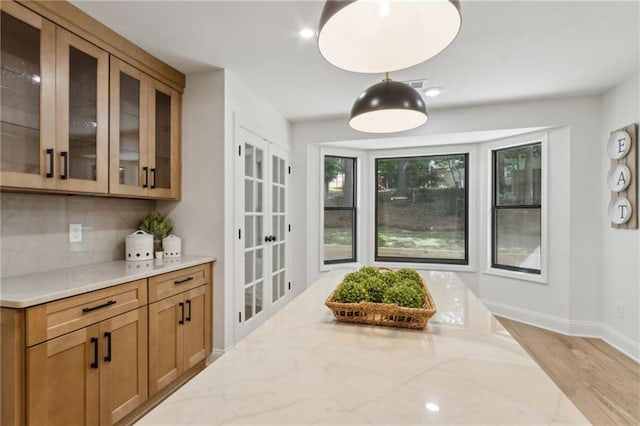 9165 Eves Cir, Roswell, GA 30076 - dining space featuring light wood finished floors and french doors