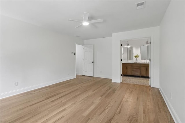 9165 Eves Cir, Roswell, GA 30076 - unfurnished bedroom with light wood-type flooring, ensuite bathroom, and ceiling fan